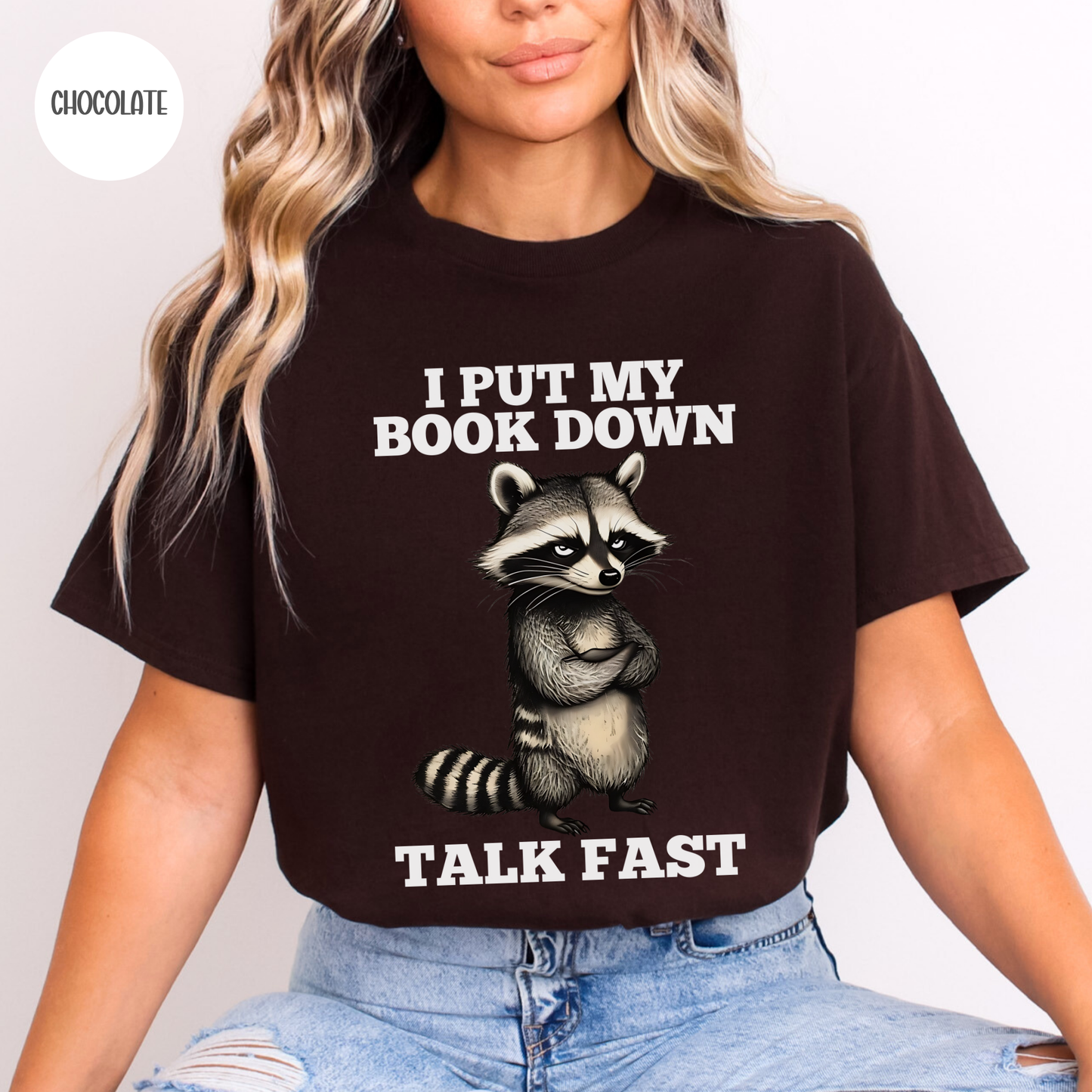 I put my Book Down Funny Raccoon T-Shirt