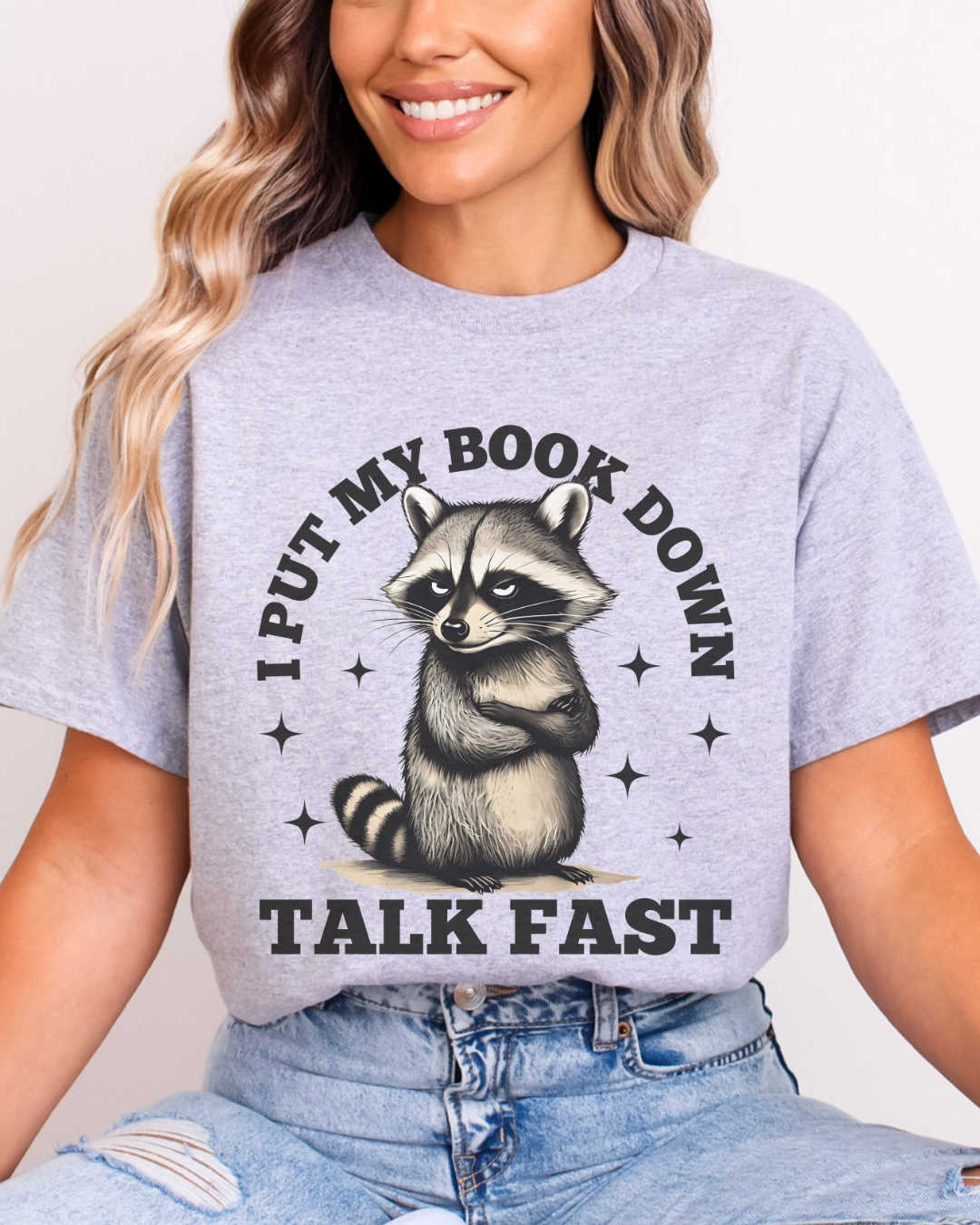 I put my Book Down Funny Raccoon T-Shirt