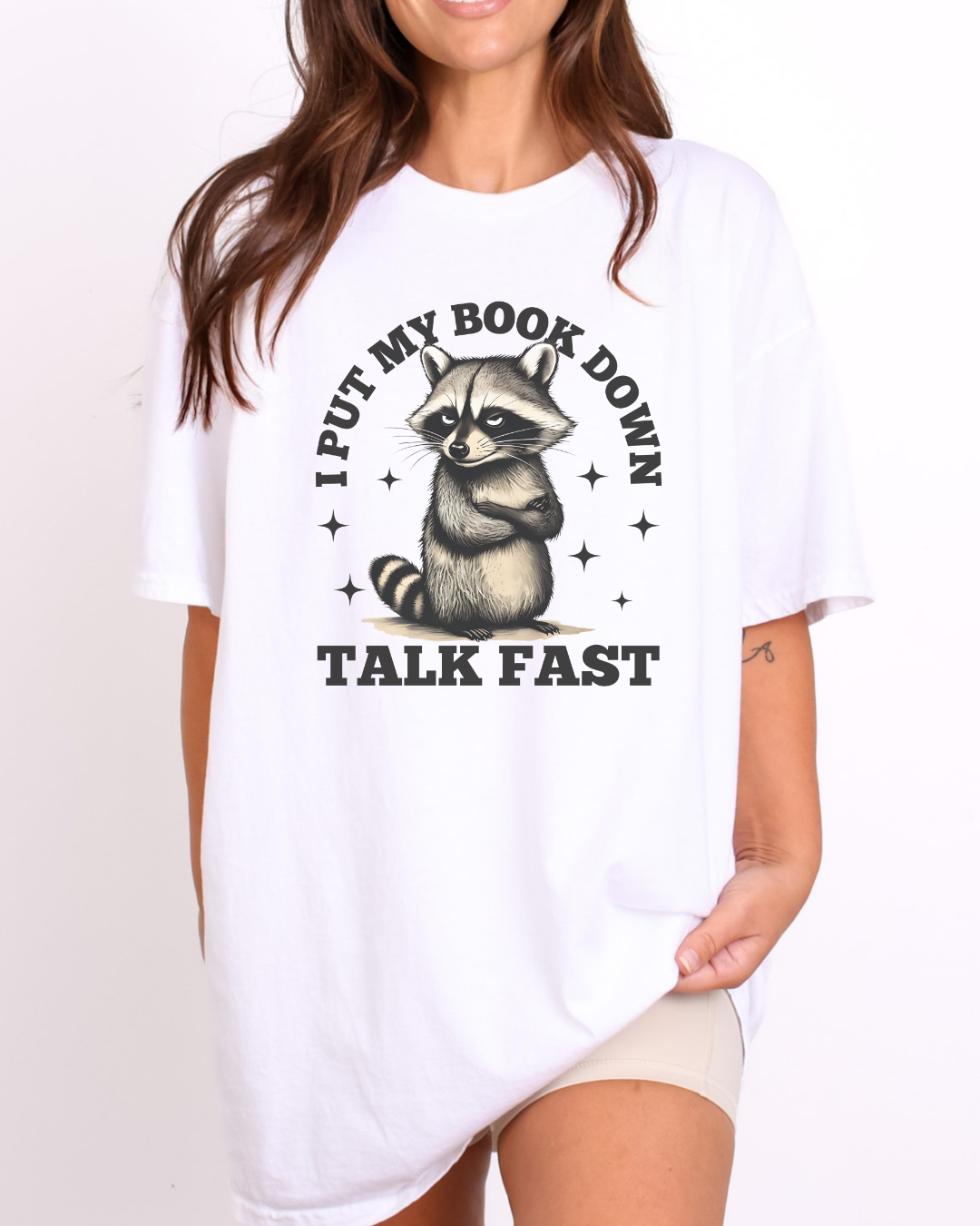 I put my Book Down Funny Raccoon T-Shirt